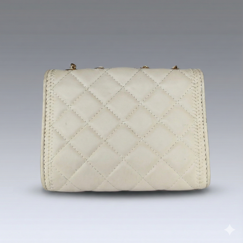The Ivory Pearl Statement Bag – Chic & Quilted
