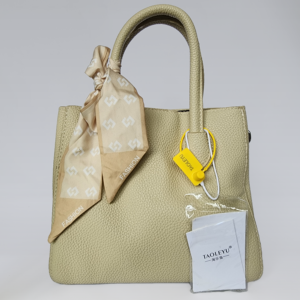 champagne pebbled leather tote bag with silk scarf accent
