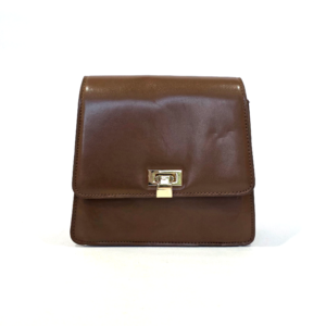Pre-loved medium brown structured minimalist flap bag with gold front clasp and accordion sides.