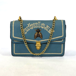 Pre-loved dusty teal blue flap bag featuring gold "Fabulous" embroidery, metallic bee hardware, and a chain strap.