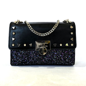 Pre-loved Charles & Keith black flap bag featuring silver studs, a dark glitter lower panel, and an engraved front clasp.