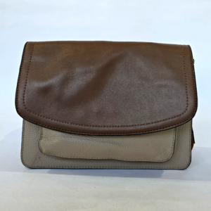 Pre-loved two-tone crossbody bag featuring a smooth brown flap and a pebbled beige front panel.