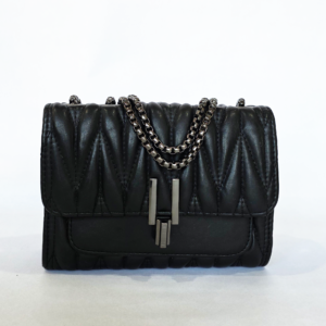 Pre-loved black quilted chevron flap bag featuring dark gunmetal hardware, a vertical front clasp, and a chain strap.