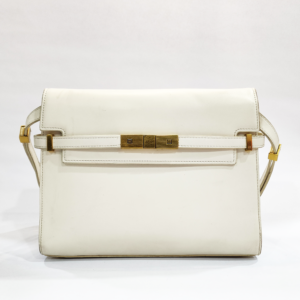 Pre-loved cream structured flap shoulder bag featuring a horizontal front strap detail and gold-tone hardware.